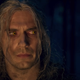 Henry Cavill as Geralt gives great side-eye in Netflix's The Witcher.
